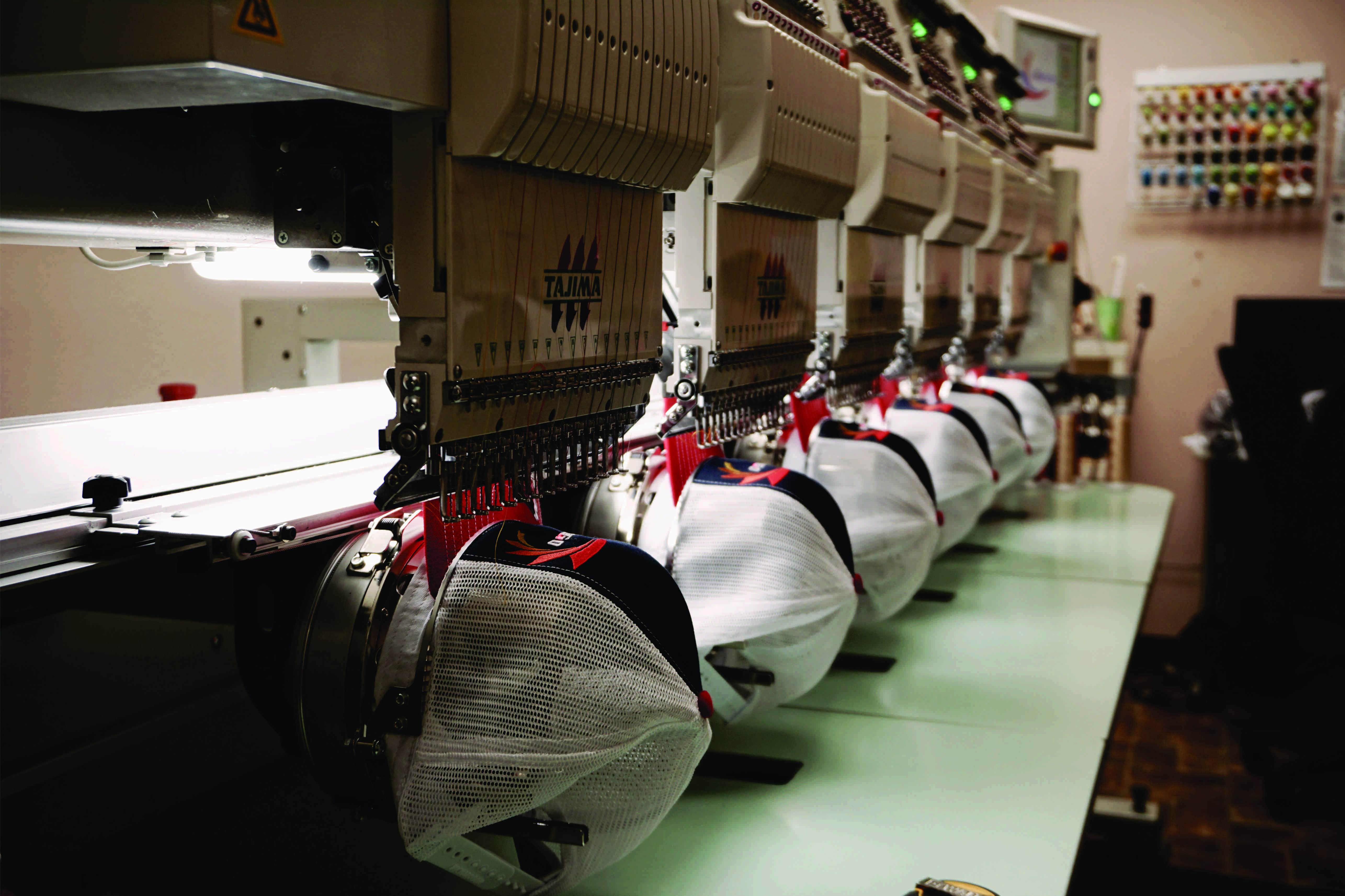 Embroidery machines sewing hats