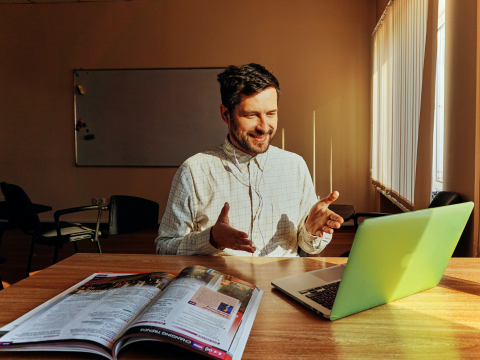 Man having a computer meeting.