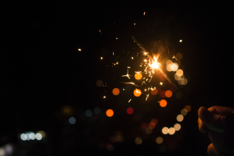 Sparklers at night.
