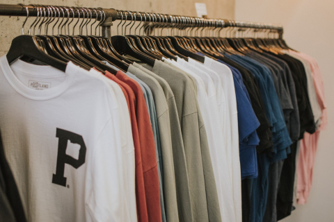 T-Shirts hanging on a rack.