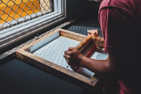 Person screen printing.